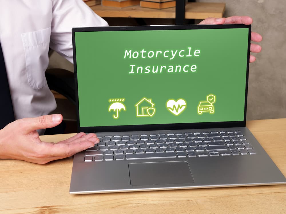 A financial concept revolving around Motorcycle Insurance, featuring a prominent phrase on the page.